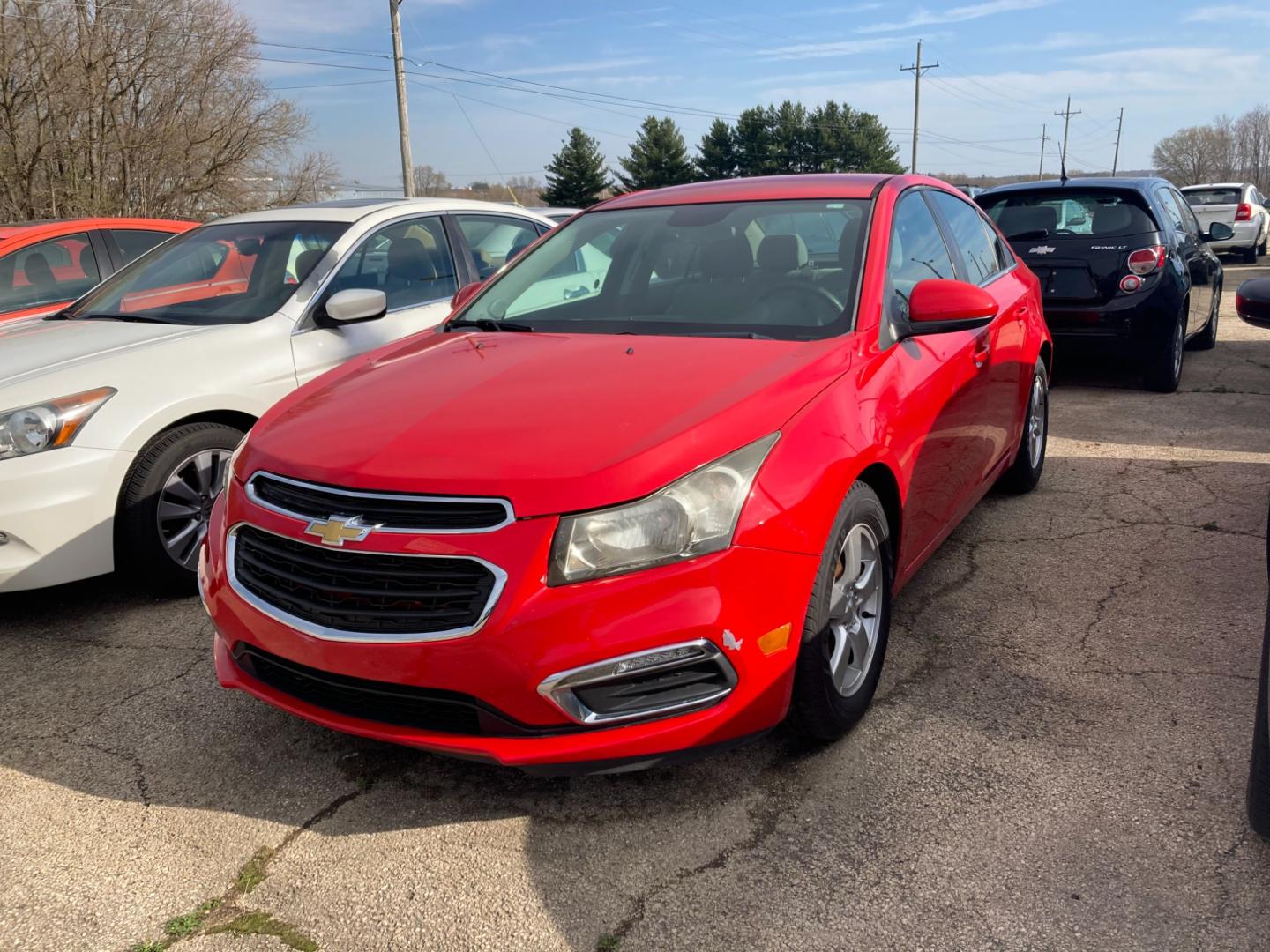 2015 Red Hot Chevrolet Cruze 1LT Auto (1G1PC5SB6F7) with an 1.4L L4 DOHC 16V TURBO engine, 6-Speed Automatic transmission, located at 1800 South Ihm Blvd, Freeport, IL, 61032, (815) 232-5543, 42.278645, -89.607994 - Photo#0